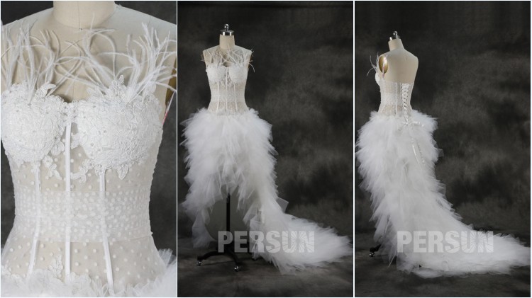 robe de mariée sexy courte devant longue derrière bustier embelli de plumes